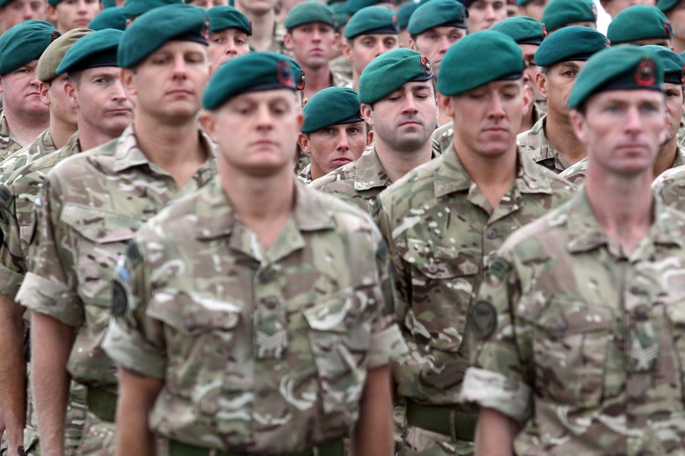 Royal Marines in uniform at a parade.