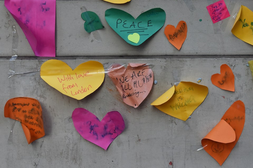 Tributes to the victims of the attack on the Paris offices of satirical weekly Charlie Hebdo are seen outside the French embassy in London in 2015