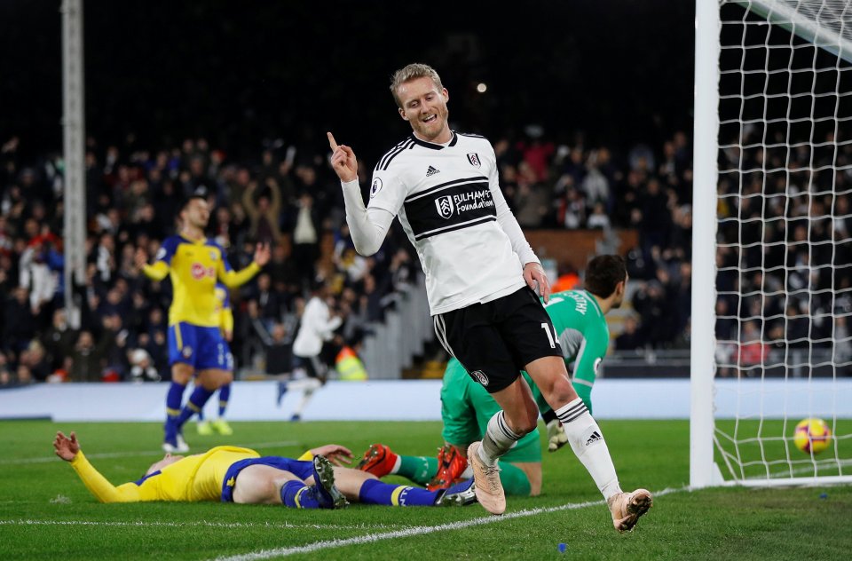 Andre Schurrle celebrates scoring a goal.