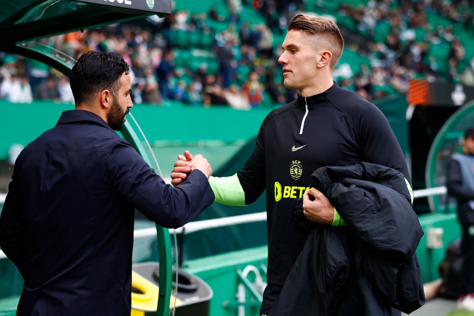 Sporting CP's Ruben Amorim and Viktor Gyokeres shaking hands at a soccer match.