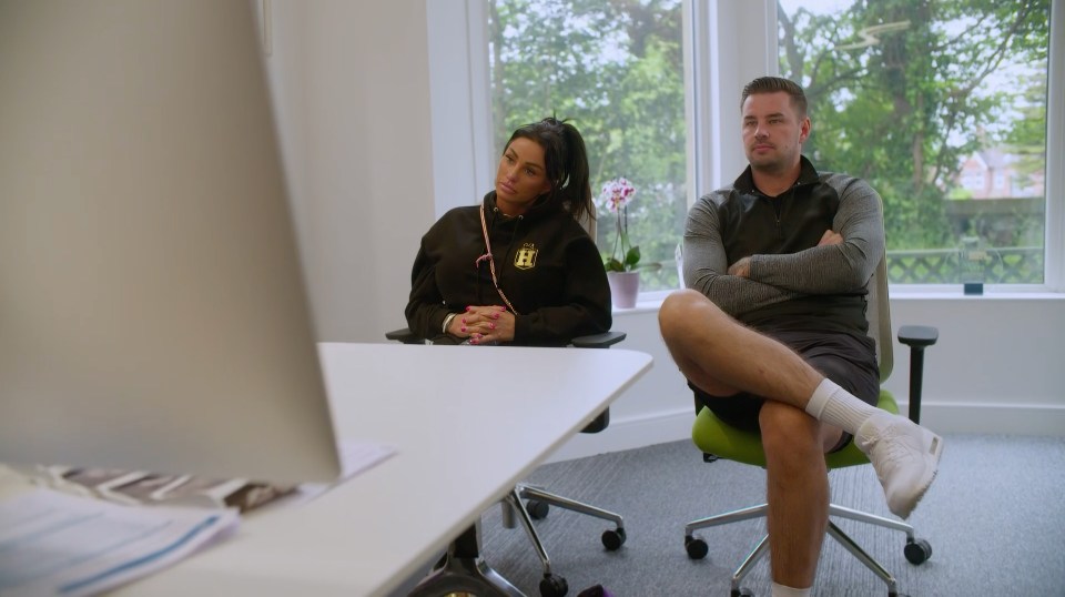 Katie Price and Carl Woods sitting in an office during an IVF consultation.