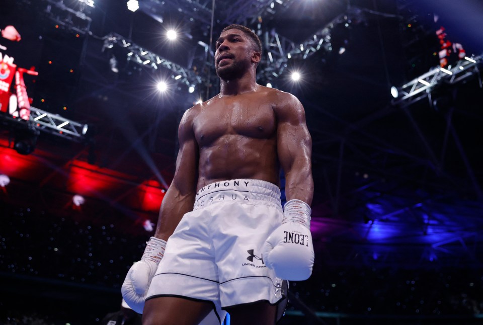 Anthony Joshua boxing at Wembley Stadium.