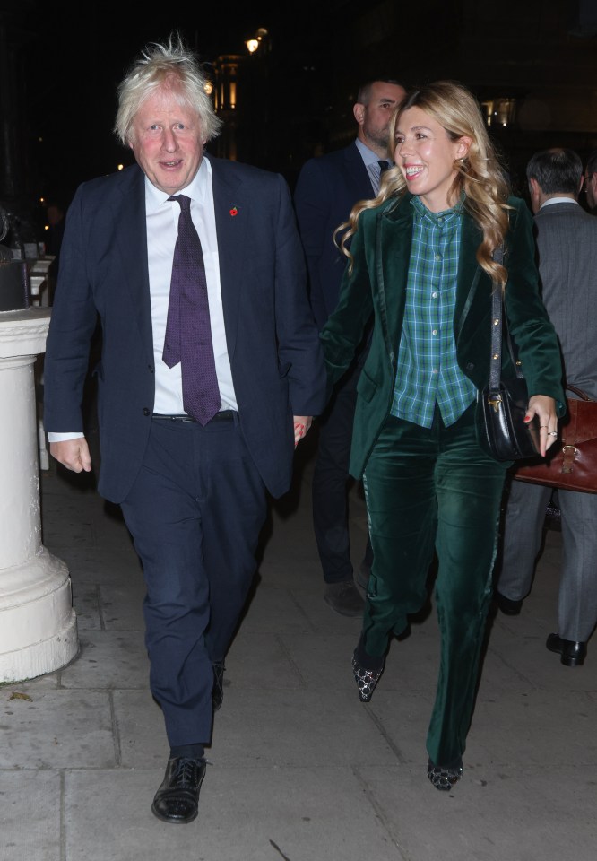 Boris Johnson and Carrie Johnson arriving at a dinner party.