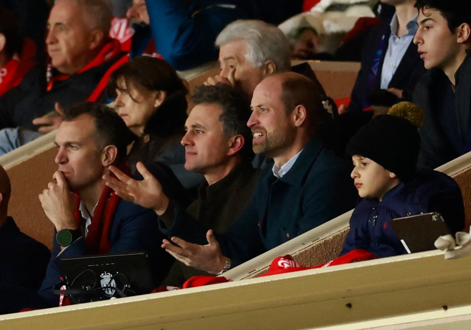 Prince William reacts at a soccer match.