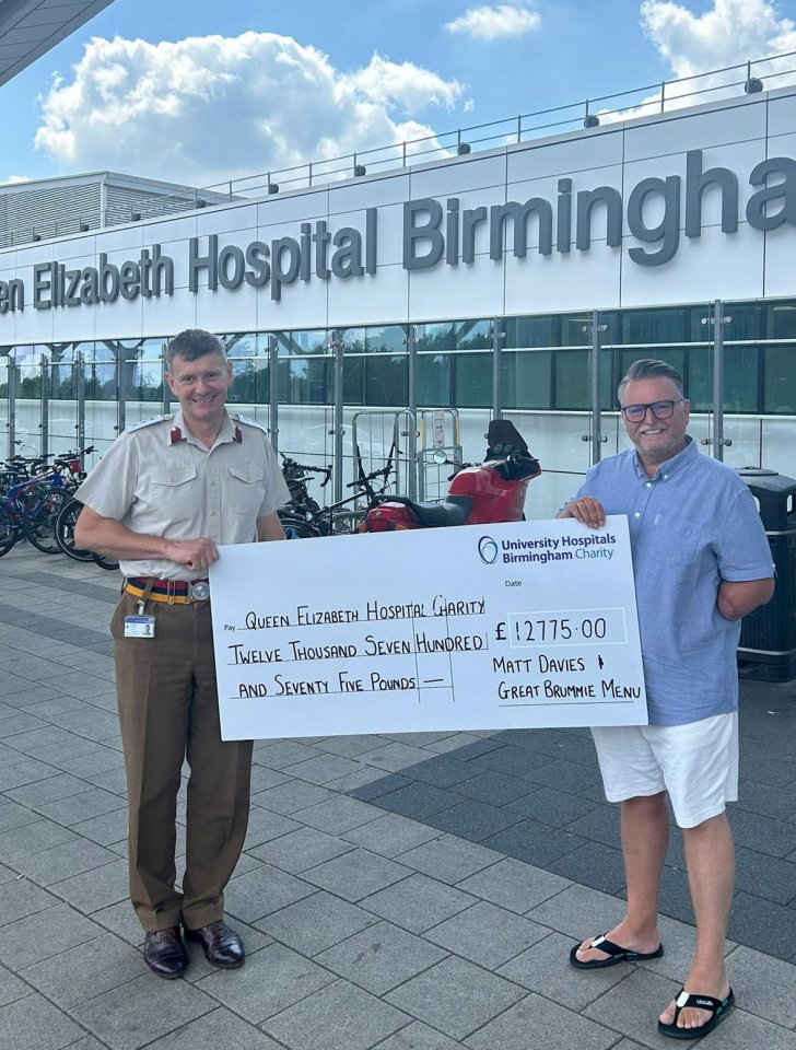 Chef Matt Davies presents a £12,775 check to the Queen Elizabeth Hospital Birmingham Charity.