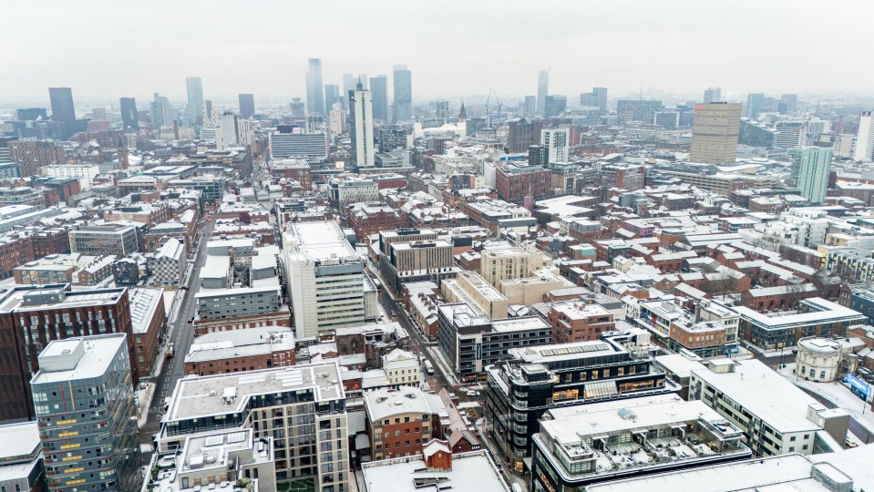 Aerial view of a snow-covered city.