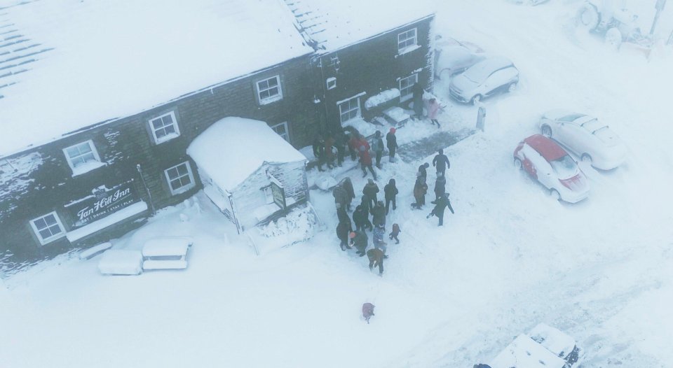 Guests at the Tan Hill Inn were led in a convoy to safety along a twisting moorland road by two farmers in snowploughs