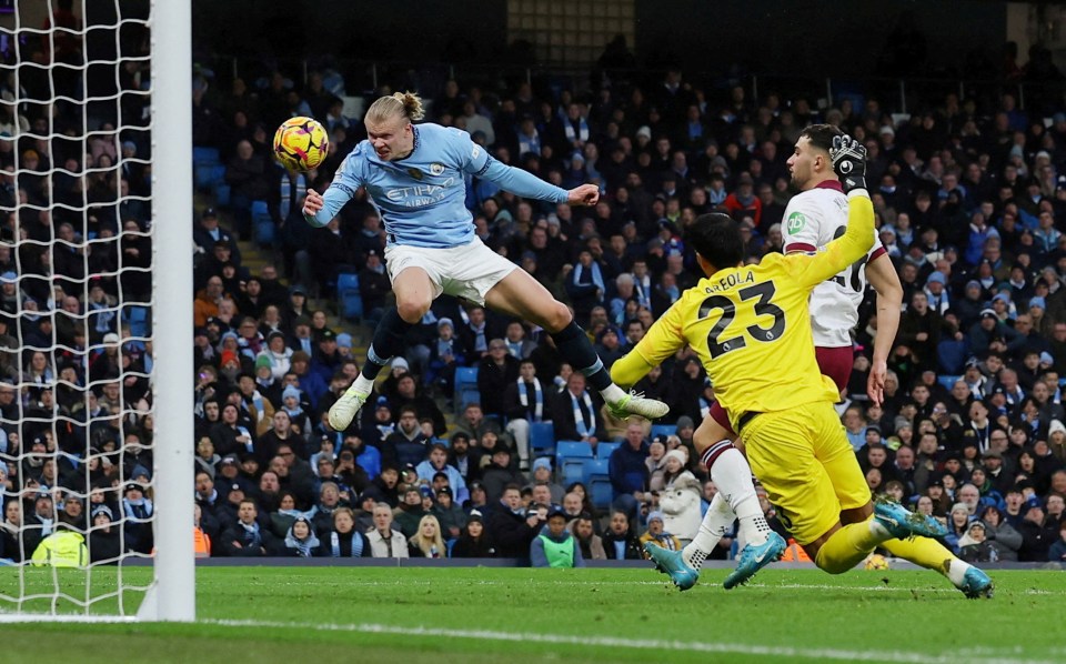 Erling Haaland scoring a goal for Manchester City.