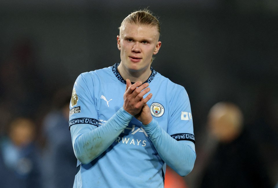 Erling Haaland applauding after a Manchester City match.