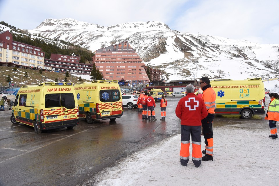 Emergency responders and ambulances at a ski resort after a chairlift accident.