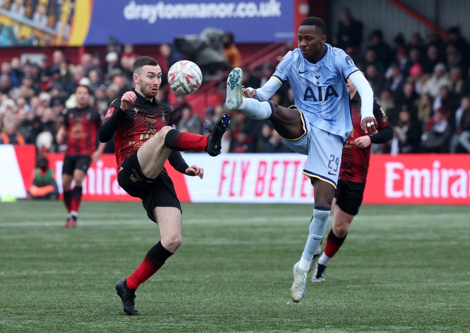 Soccer players in action during a match.