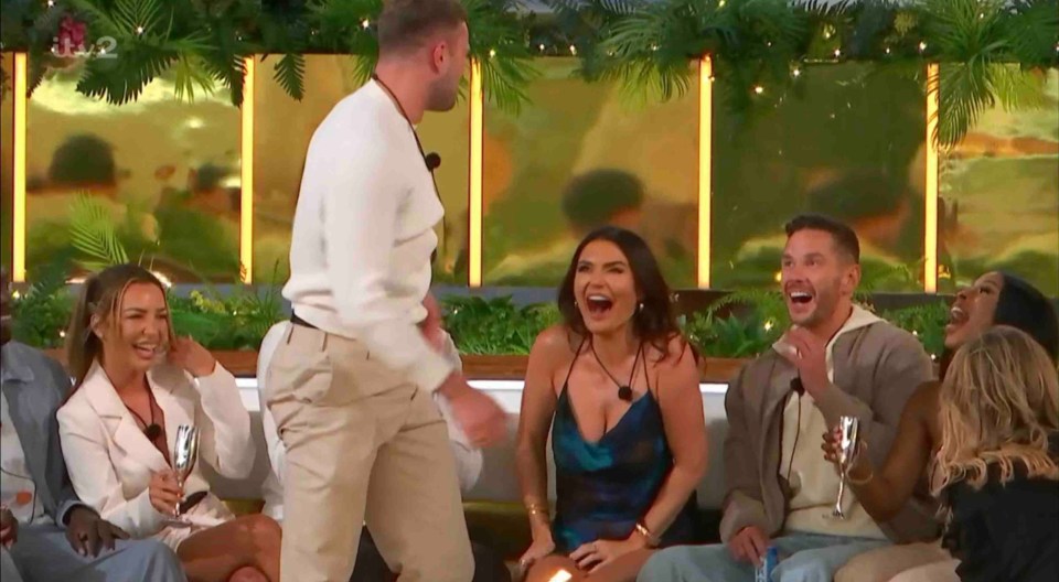 Screenshot of Love Island All Stars contestants laughing.