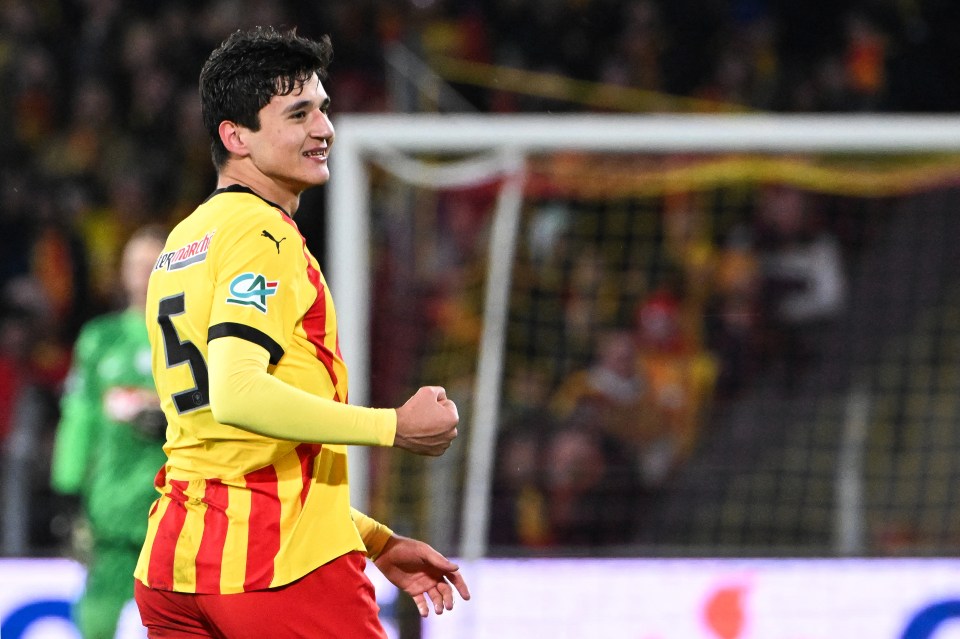 Abdukodir Khusanov, Lens #25, celebrates during a soccer match.