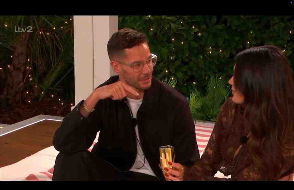 Scott Thomas and India Reynolds of ITV2 Love Island All Stars share a drink.