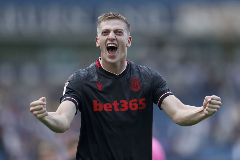 Liam Delap celebrating in a Stoke City jersey.