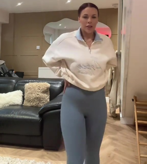 Woman modeling Primark mum-tum control leggings and matching top.