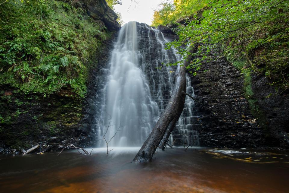 Falling Foss waterfall in North York Moors National Park.