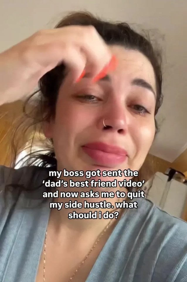 A crying woman asks for advice after her boss saw a video and asked her to quit her side hustle.