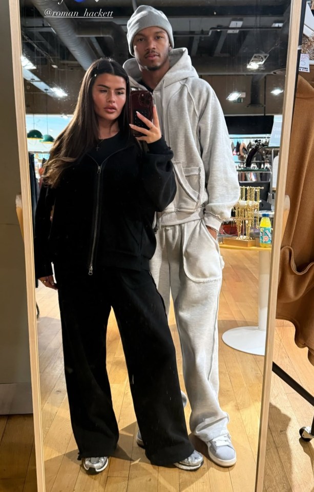 Matilda-June Draper and Roman Hackett posing for a mirror selfie.