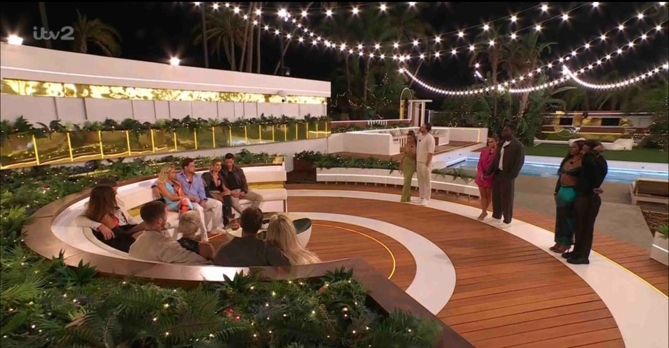 Love Island All Stars islanders at the fire pit.