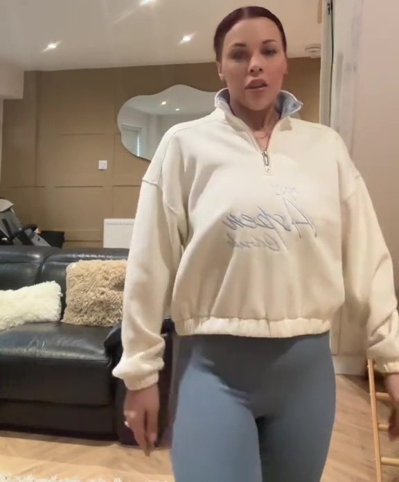 Woman modeling Primark mum-tum control leggings and matching top.