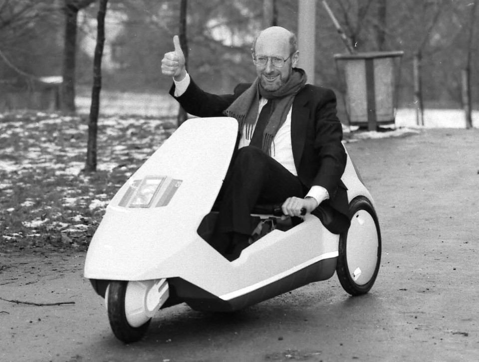 Sir Clive Sinclair in his Sinclair C5 invention.