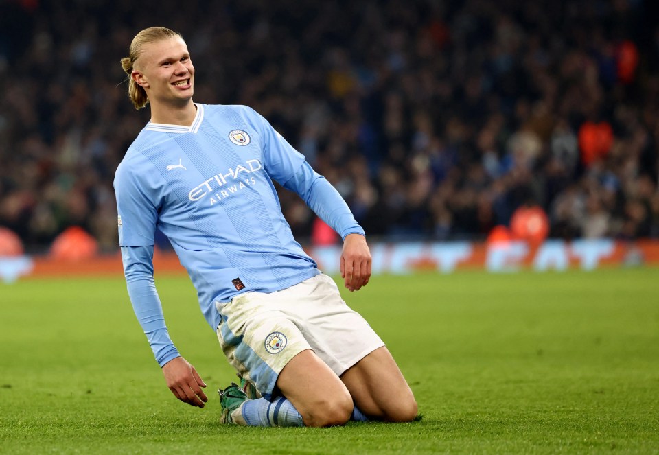 Erling Haaland celebrates scoring a goal.