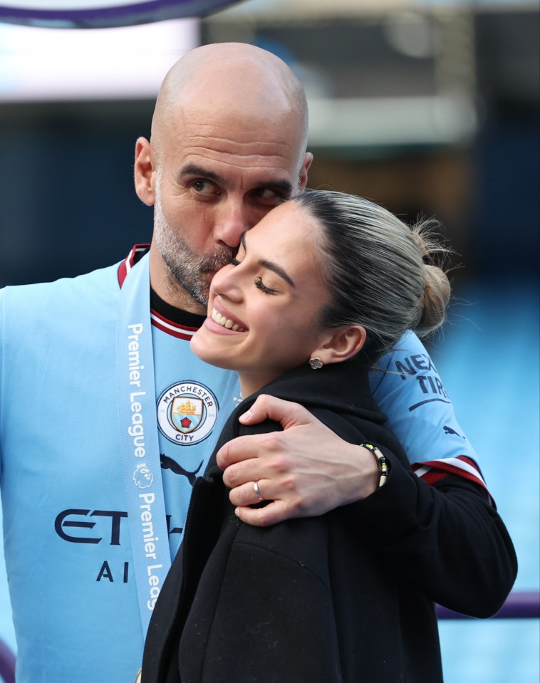 Pep Guardiola embracing his daughter.