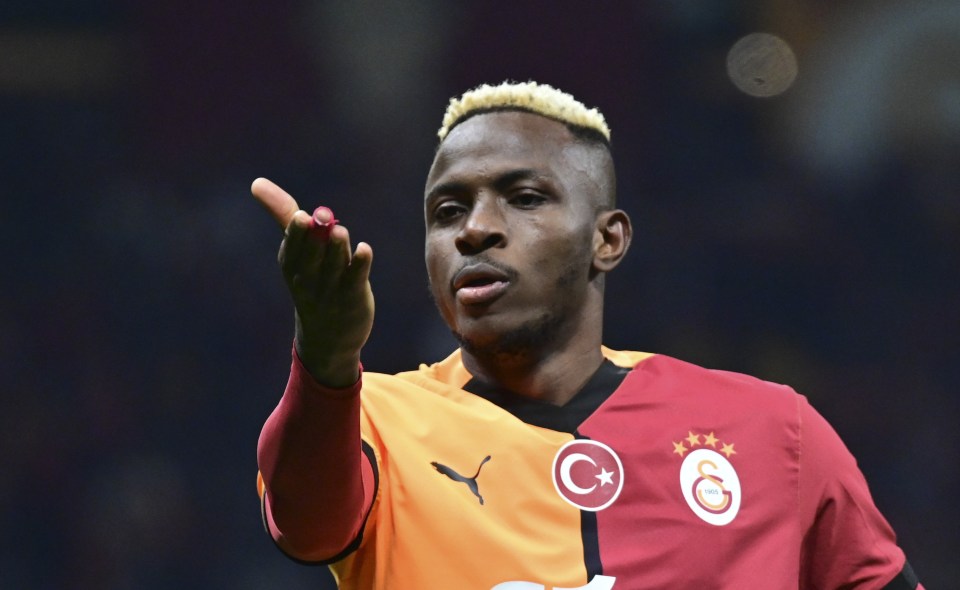 Galatasaray player celebrating a goal.