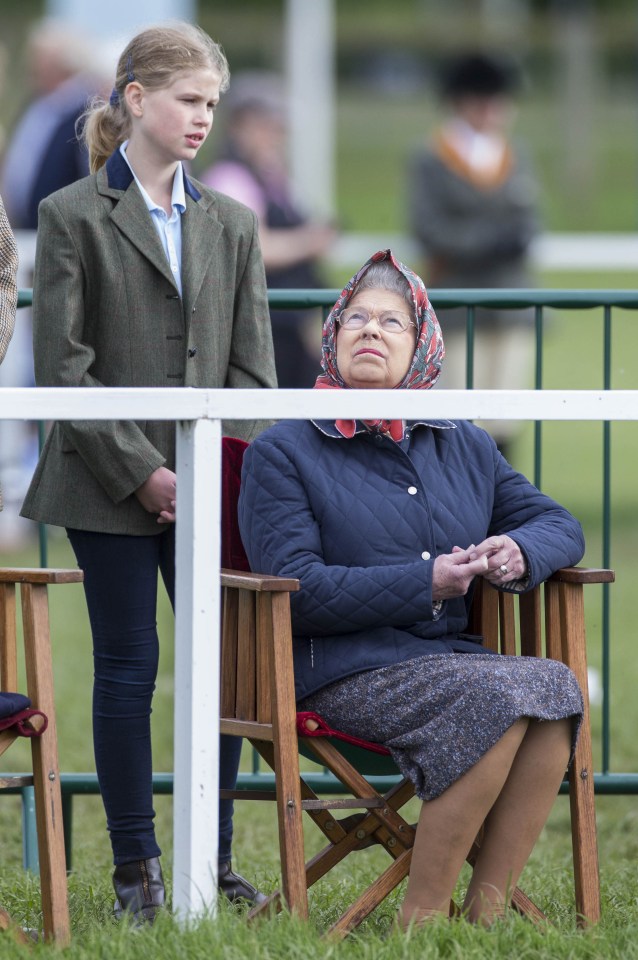 Queen Elizabeth II and Lady Louise Windsor at a horse show.