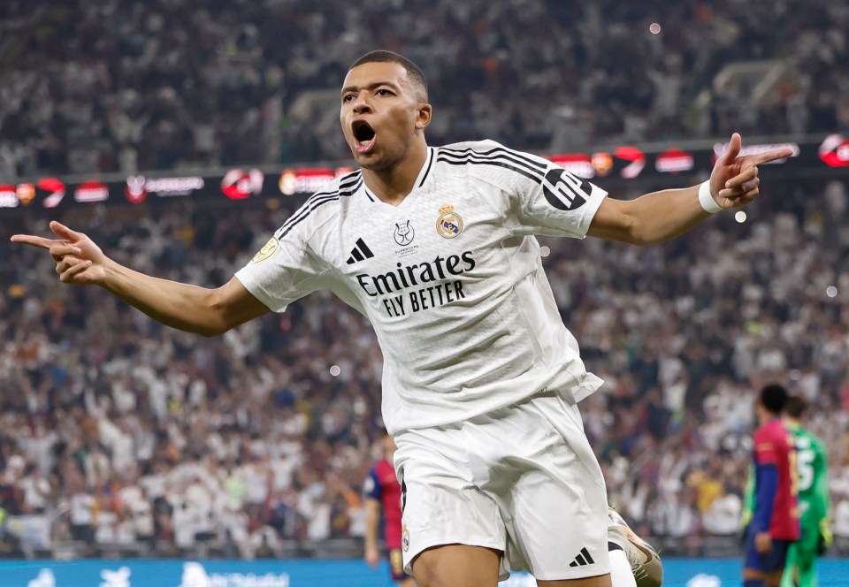 Kylian Mbappé celebrating a goal for Real Madrid.