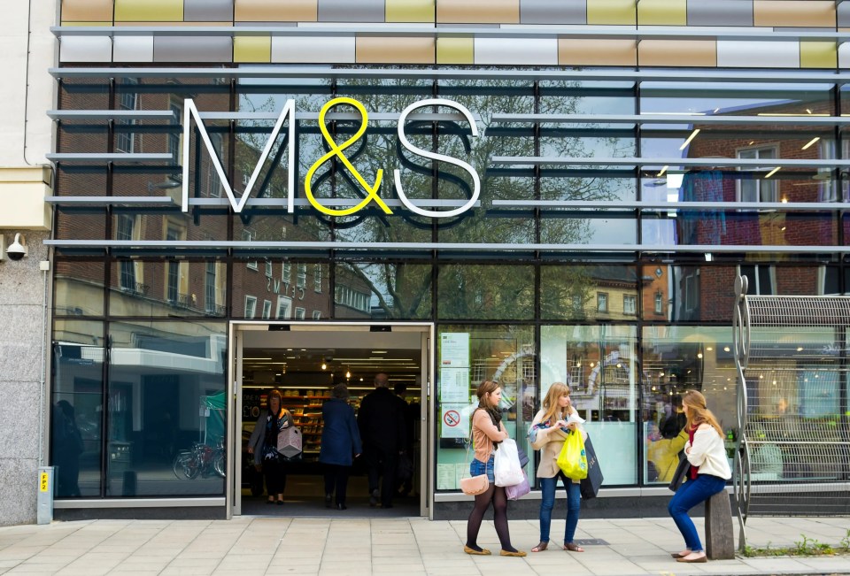 Shoppers outside a Marks & Spencer store.