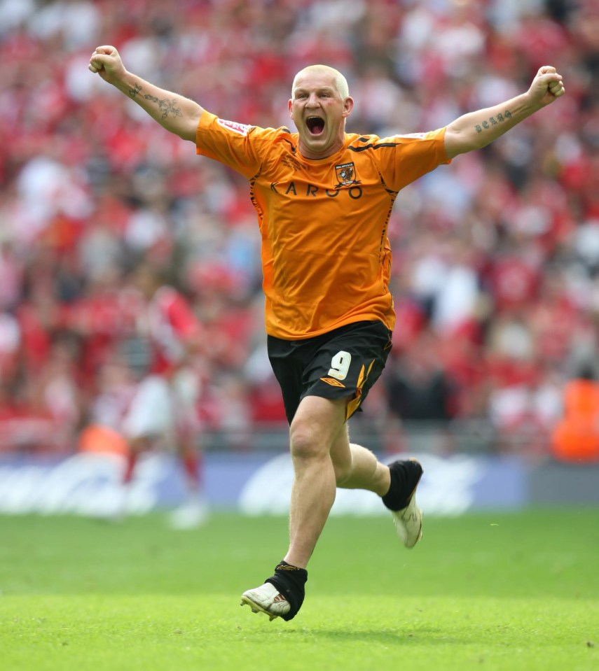 Dean Windass of Hull City celebrates scoring the winning goal.