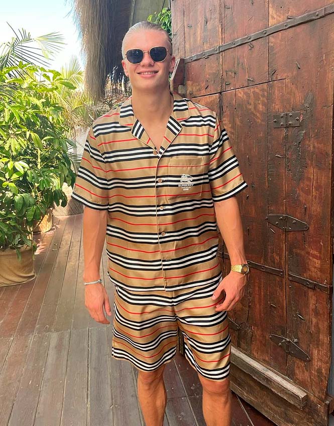 Erling Haaland wearing a Burberry silk pajama set.