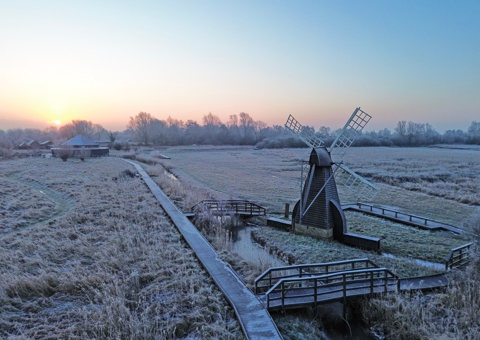 Frost-covered Wicken Fen at sunrise.