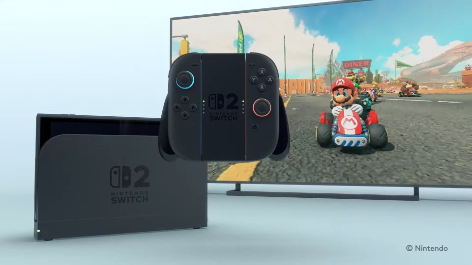 Nintendo Switch OLED model playing Mario Kart.