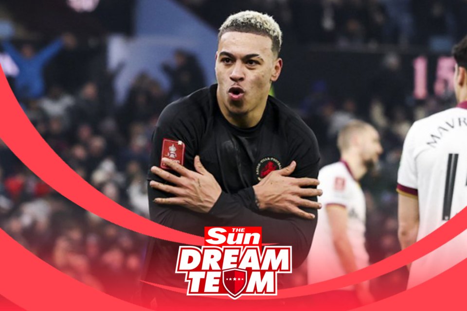 Soccer player in black jersey, arms crossed, The Sun Dream Team logo.