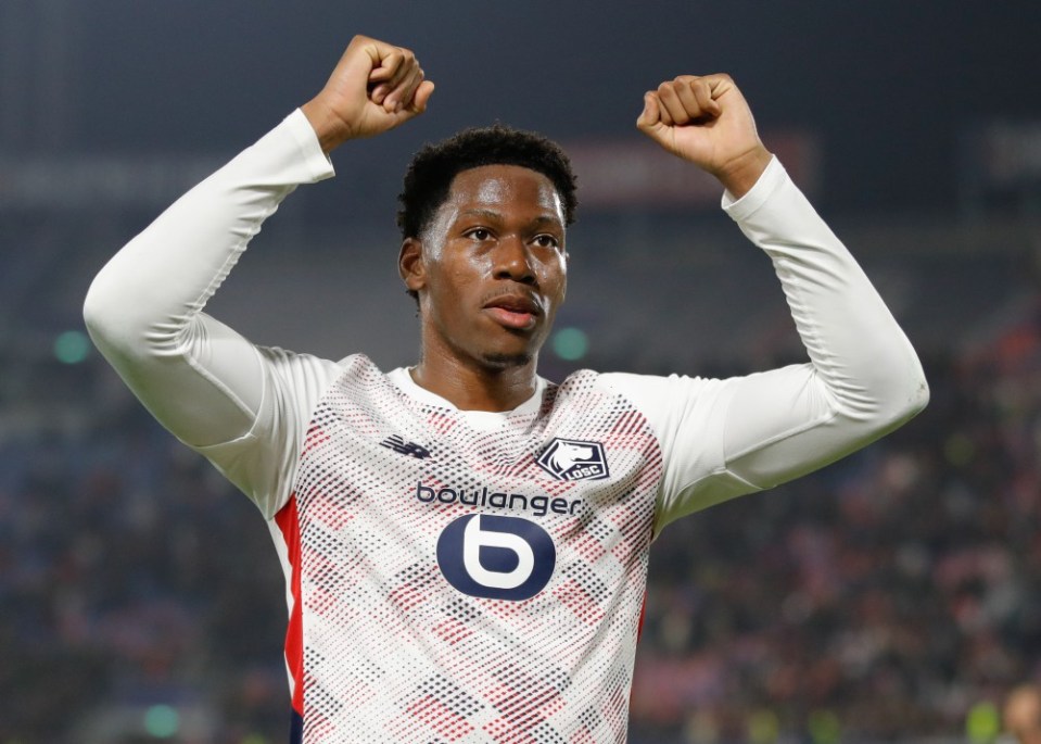 BOLOGNA, ITALY - NOVEMBER 27: Jonathan David of Lille celebrates at the end of the UEFA Champions League 2024/25 League Phase MD5 match between Bologna FC 1909 and LOSC Lille at Stadio Renato Dall'Ara on November 27, 2024 in Bologna, Italy. (Photo by Timothy Rogers/Getty Images)