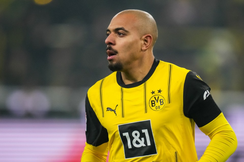 DORTMUND, GERMANY - JANUARY 10: Donyell Malen of Borussia Dortmund looks on during the Bundesliga match between Borussia Dortmund and Bayer 04 Leverkusen at Signal Iduna Park on January 10, 2025 in Dortmund, Germany. (Photo by Rene Nijhuis/MB Media/Getty Images)