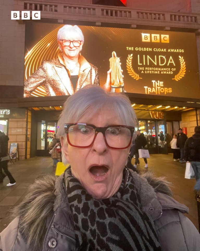 Linda's billboard in Leicester Square for The Golden Cloak Awards.