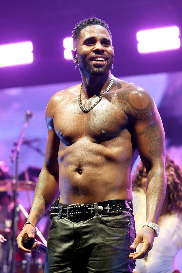 Jason Derulo performing on stage.