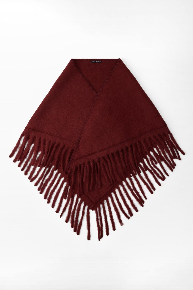 Burgundy fringed shawl.