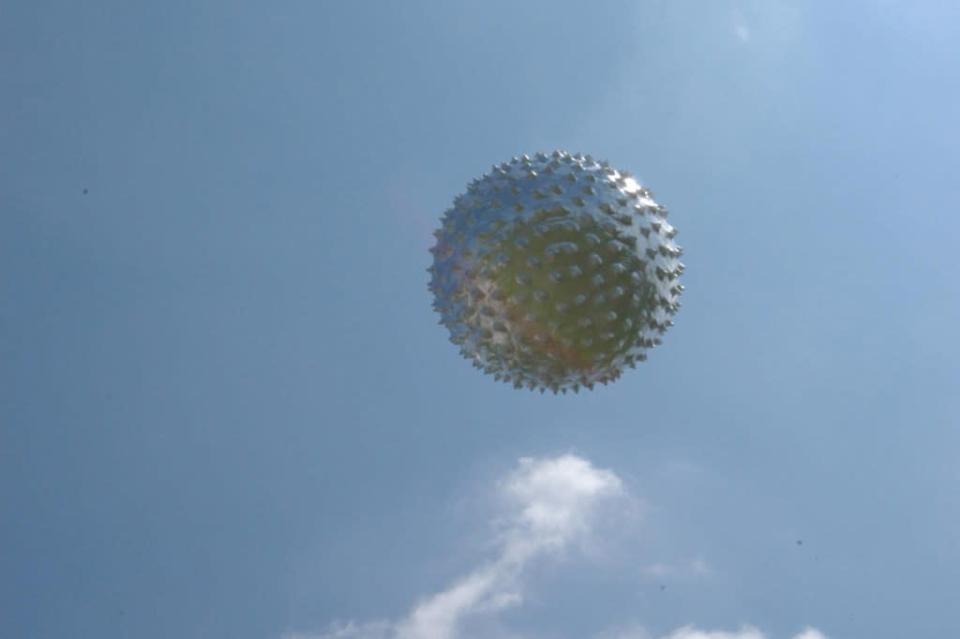 A depiction of metallic orbs provided by NASA as part of a 2023 UAP report