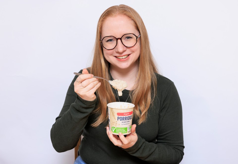 Woman eating porridge.