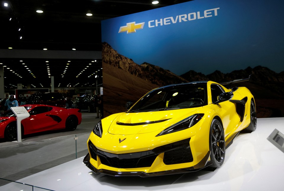 Yellow Chevrolet Corvette ZR1 coupe at auto show.