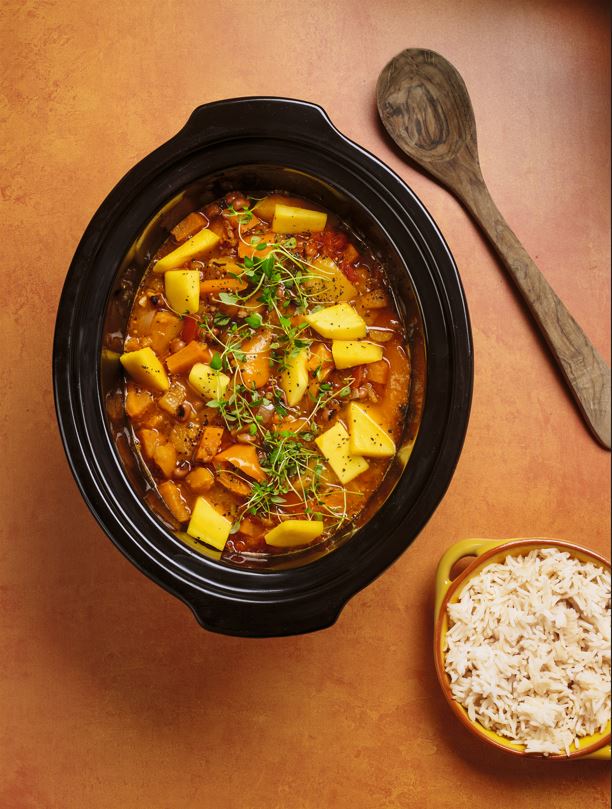 Sunshine stew in a slow cooker with rice.