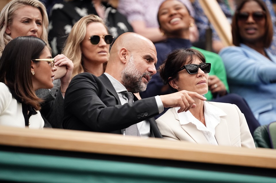 Pep Guardiola with his wife and daughter at Wimbledon.