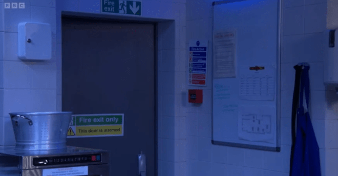 Screenshot of a fire exit door in a kitchen.