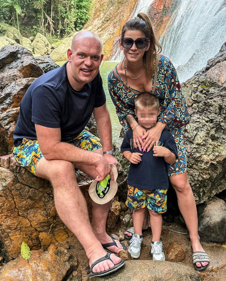 Family portrait by a waterfall.