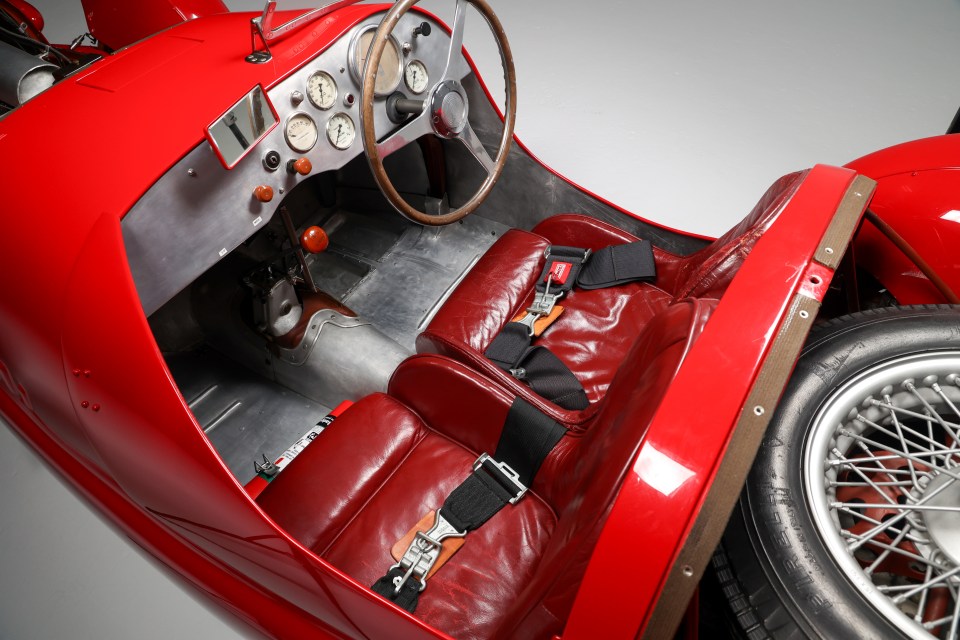 Interior of a red vintage race car.